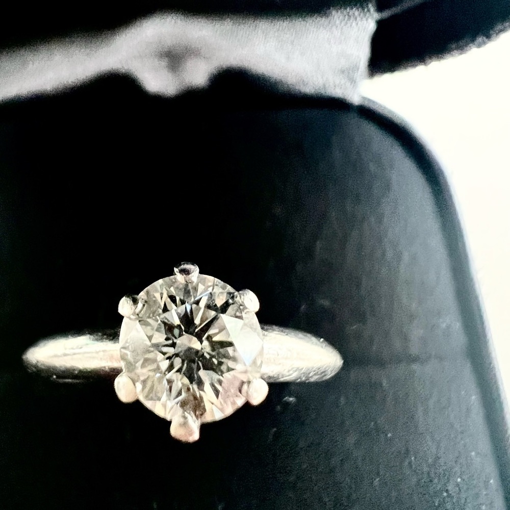 Tiffany brilliant cut round solitaire. .78ct platinum, Color G, XS2